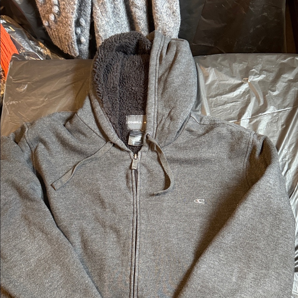 O’Neill Gray hooded jacket Sz Lg heavy to med weight 
plush lining side pockets